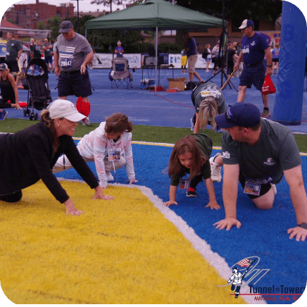 Shearer Heating, A/C & Refrigeration team stretching before charity run in Washington, Pennsylvania.